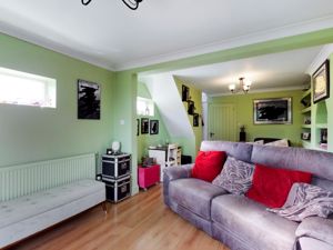 Through sitting room towards kitchen - click for photo gallery
